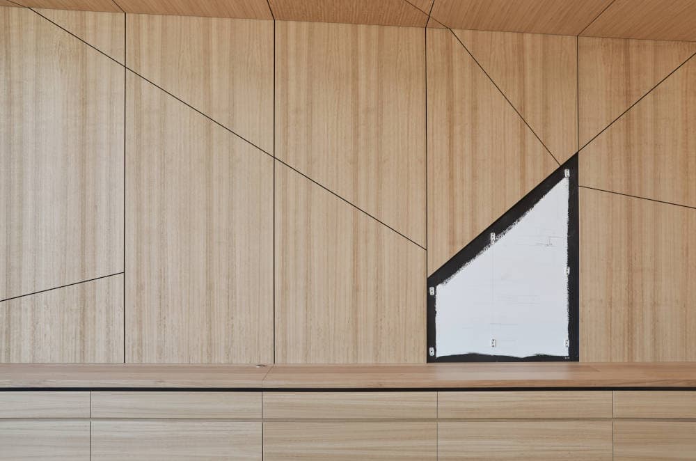 Complex geometry wall panel with angular window cutout before completion